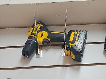дирел ударний: Аккумуляторная дрель-шуруповерт DeWalt 18V - Компактная — 1