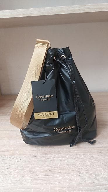 Личные вещи: Продаю .Оригинал привезён из Европы. Сумка-косметичкаCalvin Klein — 2