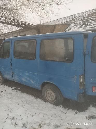 зил мост: Синий фургон/микроавтобус с раздвижной боковой дверью и остеклением по — 1