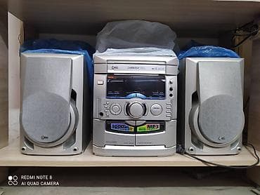 Продаю недорого LG музыкальный центр есть AUX есть и другие муз