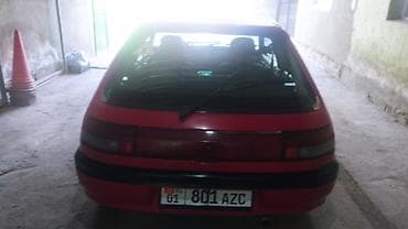 бампер на мазду демио: Mazda 323: 1991 г., Автомат, Бензин, Хэтчбэк — 5