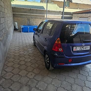 Транспорт: Daihatsu YRV: 2002 г., 1.3 л, Механика, Бензин — 8