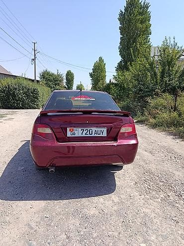 235 65: Daewoo Nexia: 2009 г., Механика, Седан — 1