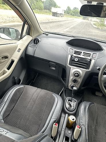 byd e7: Toyota Vitz: 2006 г., 1.3 л, Автомат, Бензин, Седан — 6