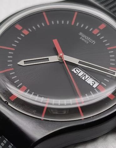 Личные вещи: Швейцарские Swatch Swiss — кварцевые наручные часы с календарем дня — 1