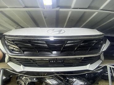 Передняя часть (морда) Hyundai: решетка радиатора с эмблемой и верхним