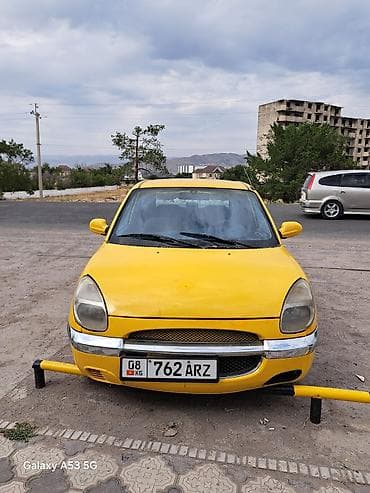 авто компании: Daihatsu Sirion: 1998 г., 1 л, Механика, Бензин, Хэтчбэк — 6