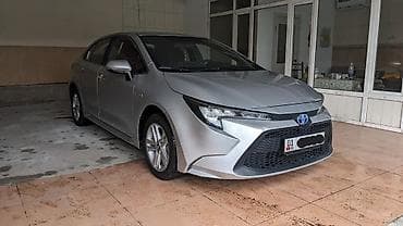 camry 80: Toyota Corolla: 2019 г., 1.8 л, Вариатор, Гибрид, Седан — 1