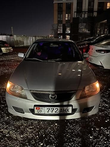 mazda 121: Mazda Familia: 2003 г., Автомат, Бензин, Хэтчбэк — 8