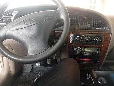 audi s 4: Daewoo Nubira: 2002 г., Механика, Седан — 4