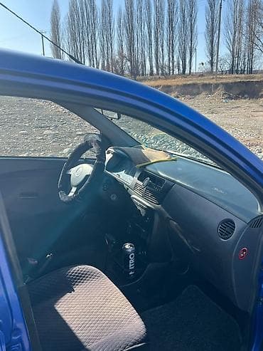 golf 2: Daihatsu Cuore: 2003 г., Автомат, Бензин, Хэтчбэк — 2