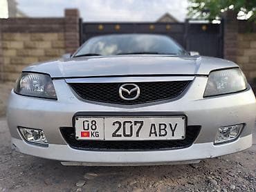 Mazda 323: 2003 г., 2 л, Кол менен иштөөчү, Газ, Хетчбек — 4