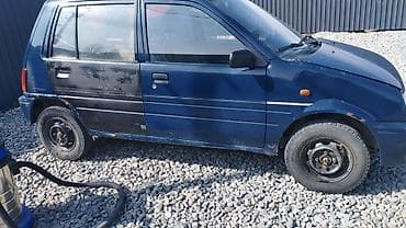 машина делика: Daihatsu Cuore: 1991 г., 0.8 л, Ручные, Бензин, Хэтчбэк — 1