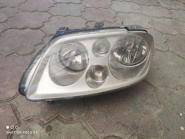 Передняя фара volkswagen touran volkswagen caddy левая сторона at lalafo.kg Передняя фара volkswagen touran volkswagen caddy левая сторона