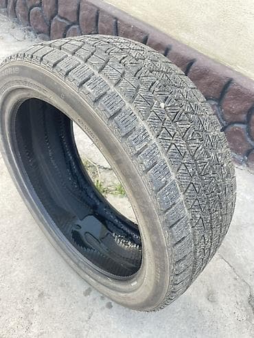 на тико: Зимние шины (без шипов), комплект из 4 шт. - Размер: 245/40 R19 - — 2