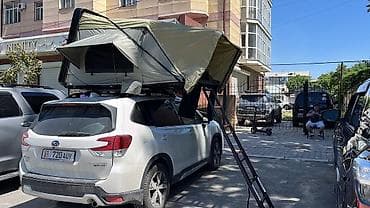 авто спальник: Автомобильная палатка на крышу (рюфтоп-тент) с жёстким чехлом - Тип — 5
