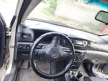 салон машины: Toyota Corolla: 2005 г., 1.6 л, Механика, Бензин, Седан — 2