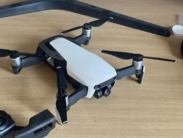 Дроны: Комплект для дрона DJI Mavic Air. Включает в себя сам дрон серого — 5