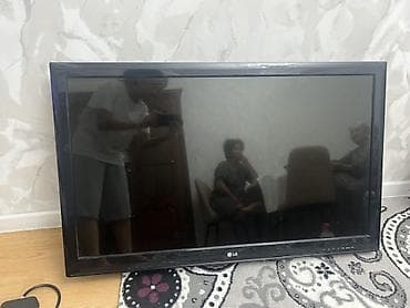 Телевизор LG, диагональ ориентировочно 32–37 дюймов (формат 16:9) — 3
