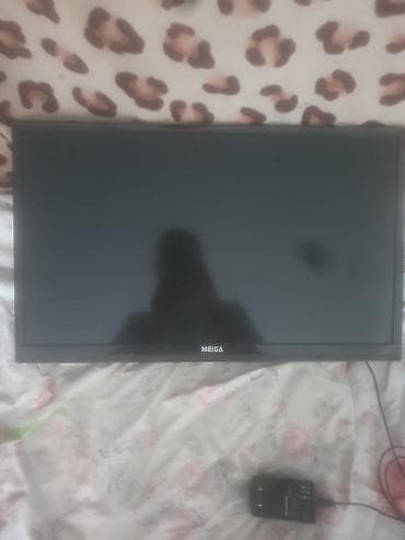 укмуш тв: Телевизор MEIGA LED-24E66TS - Диагональ: 24 дюйма (LED-подсветка) - — 2