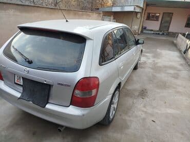 продаю или меняю на недвижимость: Mazda 323: 2002 г., 1.6 л, Механика, Бензин, Хэтчбэк — 5