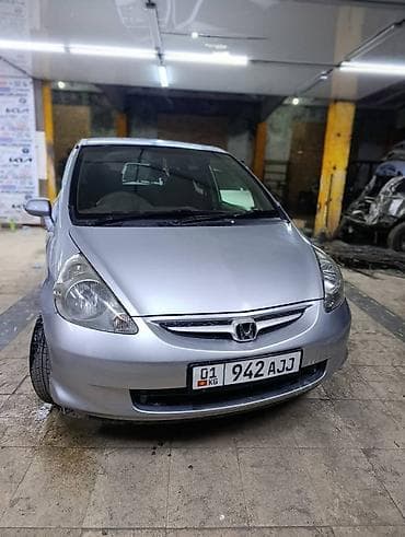 sleep kg: Honda Fit (релиз до рестайлинга), 5‑дверный хэтчбек, серебристый цвет — 6