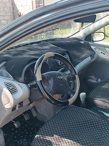 миз 82 1: Nissan Tino: 2002 г., 1.8 л, Механика, Бензин, Хэтчбэк — 8