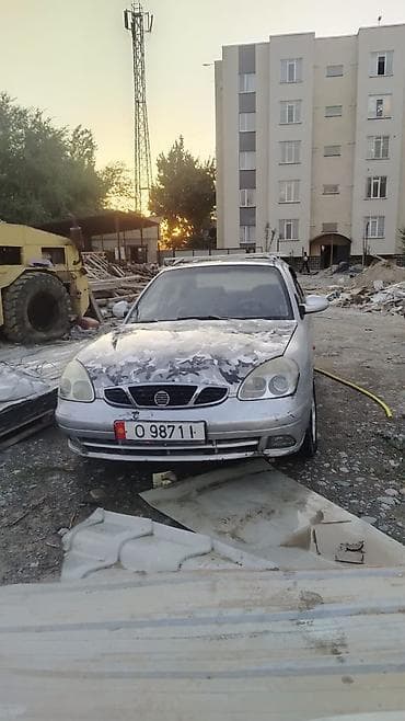 шина на матиз: Daewoo Nubira: 1999 г., Механика, Бензин, Седан — 6