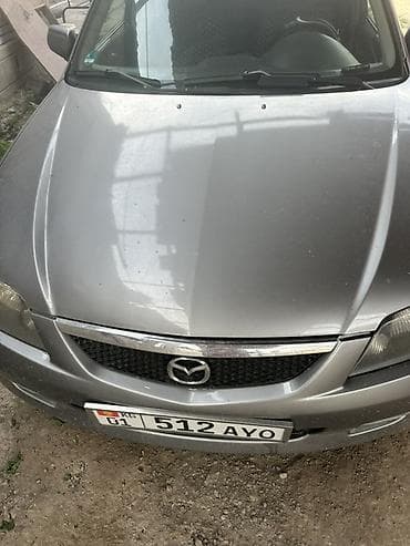 мини машины для взрослых: Mazda Familia: 2002 г., Механика, Бензин, Седан — 4