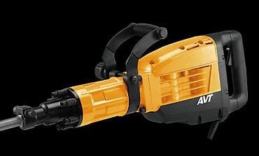 Строительное оборудование: Отбойный молоток в черно-оранжевом корпусе с дополнительной рукояткой — 3