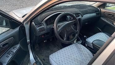 Транспорт: Mazda 626: 1997 г., 1.8 л, Механика, Газ, Седан — 3