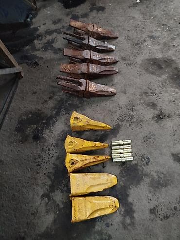 Насадки и держатели зубьев на ковш экскаватора Состав: - 5 желтых — 1