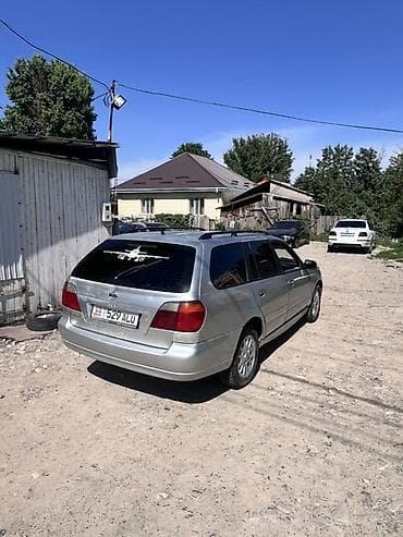 geely galaxy e5: Nissan Primera: 2001 г., 2 л, Механика, Бензин, Универсал — 6