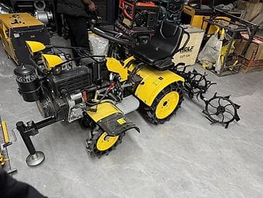 немецкий трактор: Мини-трактор (мотоблок с прицепным сиденьем) жёлтого цвета Описание — 3