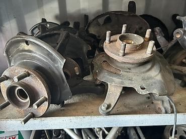 Ступичные узлы/поворотные кулаки (передние), комплект. - Тип