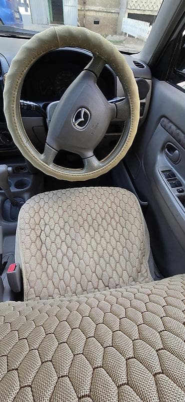 Mazda Demio: 2000 г., 1.3 л, Автомат, Бензин, Универсал