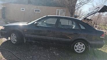 Mazda 626: 1999 г., 1.8 л, Механика, Лифтбек