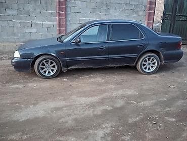 мисубиси спейс стар: Kia Clarus: 2000 г., 1.8 л, Автомат, Седан — 4