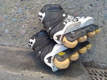 продаю связи с переездом: Ролики (чёрные) — 3