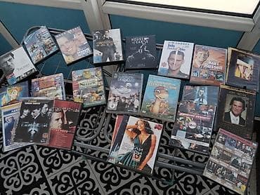 Коллекция DVD-дисков (игровые фильмы, сериалы и мультфильмы), цена за