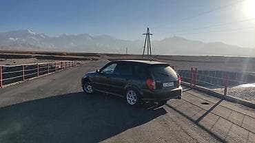 Mazda Familia: 2002 г., 2 л, Автомат, Бензин, Универсал
