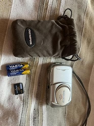 Фотоаппараты: Цифровые фотокамеры Olympus Camedia C-160 и Praktica DC 60 — комплект — 1