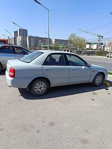 tayota progres: Mazda 323: 2002 г., 1.6 л, Ручные, Бензин, Седан — 1