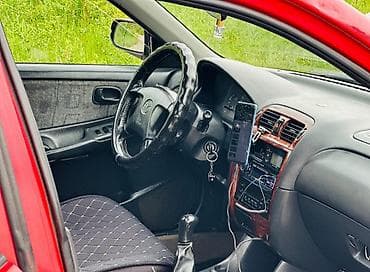 ош жапалак: Mazda 626: 1998 г., 2 л, Кол менен иштөөчү, Бензин, Седан — 5