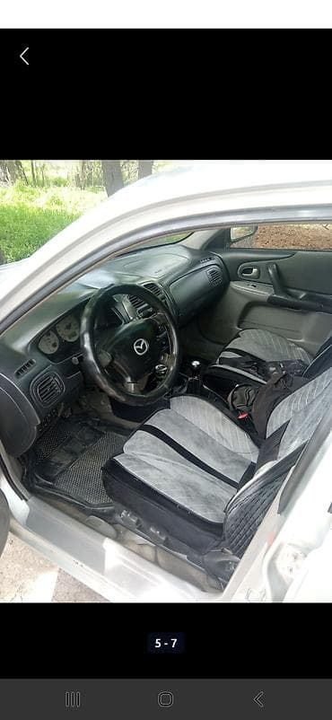 erec m8: Mazda 323: 2003 г., 1.6 л, Механика, Бензин, Универсал — 3