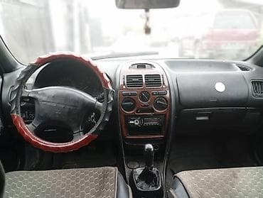 Mitsubishi Carisma: 1999 г., 1.6 л, Механика, Бензин, Седан