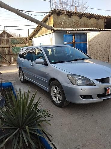 Продажа авто: Mitsubishi Lancer: 2004 г., 2 л, Механика, Бензин, Универсал — 6