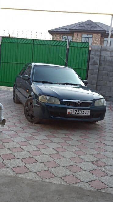 продаю или меняю на дом: Mazda 323: 2000 г., 1.6 л, Механика, Бензиновая, Седан — 4