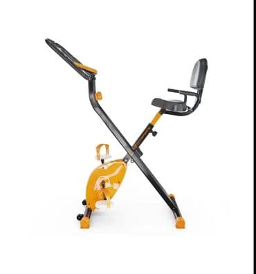 сколько стоит эллиптический тренажер: Складной велотренажер X-образной конструкции, выполненный в черном — 1