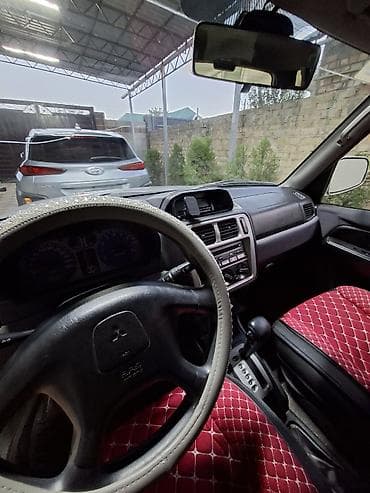 горный: Mitsubishi Pajero iO: 2001 г., 2 л, Автомат, Бензин, Внедорожник — 5